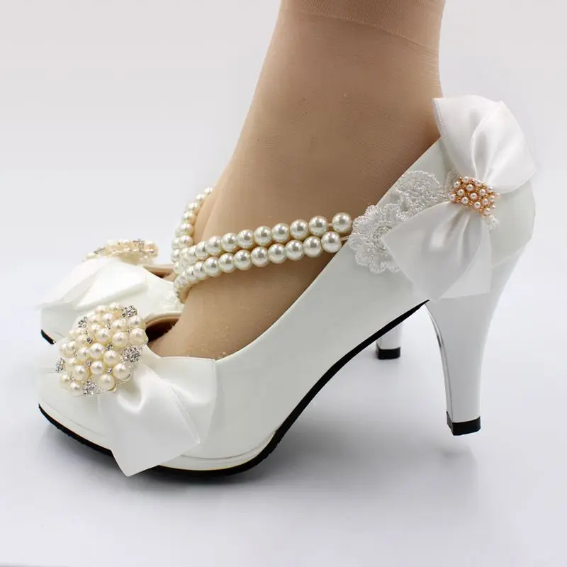 white heels with bows