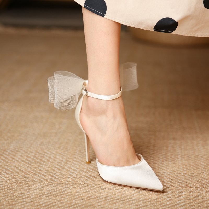 white heels with bows